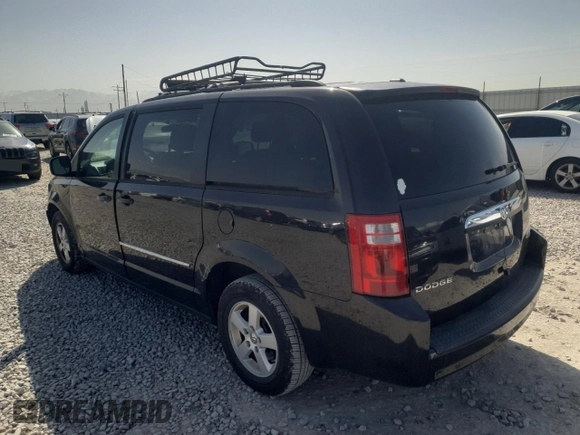 2010 Dodge Grand Caravan with VIN 2D4RN5D1XAR323622, listed as a Copart auction lot 52638465 with 158,491 mi miles and Salvage Title. Bid and sale history available at DreamBid. Image 2.
