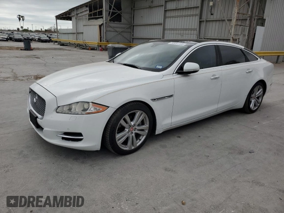 2014 Jaguar XJ Portfolio with VIN SAJWJ2GD6E8V65987, listed as a Copart auction lot 50091105 with 136,080 mi miles and Clean title. Bid and sale history available at DreamBid. Image 1.