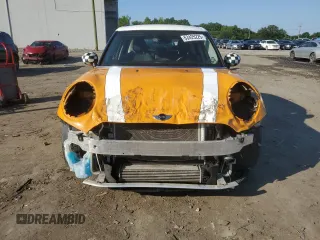 2016 MINI Hardtop 4 Door с VIN WMWXU1C51G2E16685, выставлен на аукционе Copart как лот 63425225 с пробегом 117 597 миль миль и Списание • Salvage title. История ставок и продаж доступна на DreamBid. Изображение 5.