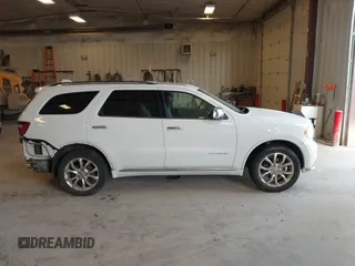 2016 Dodge Durango Citadel with VIN 1C4RDJEG9GC371805, listed as a IAAI auction lot 42135988 with 122,924 mi miles and . Bid and sale history available at DreamBid. Image 13.