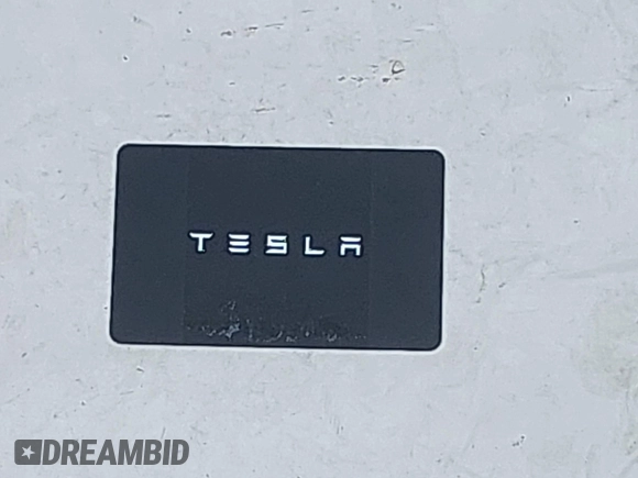 2023 Tesla Model Y Long Range with VIN 7SAYGDEEXPA044335, listed as a IAAI auction lot 42350159 with 26,731 mi miles and . Bid and sale history available at DreamBid. Image 11.