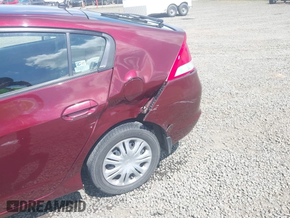 2011 Honda Insight LX z VIN JHMZE2H51BS004312, wystawiony jako IAAI lot #42086422 z przebiegiem 72 814 mil mil oraz . Historia ofert i sprzedaży dostępna na DreamBid. Obrazek 6.