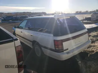 1994 Subaru Legacy L with VIN 4S3BJ6335R9948773, listed as a Copart auction lot 77018384 with 189,202 mi miles and Clean title. Bid and sale history available at DreamBid. Image 2.