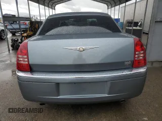 2006 Chrysler 300 C with VIN 2C3KA63H26H218136, listed as a Copart auction lot 49209315 with 215,682 mi miles and Salvage Title. Bid and sale history available at carsss.com. Image 6.