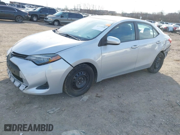2019 Toyota Corolla L with VIN 2T1BURHE7KC223002, listed as a IAAI auction lot 41371130 with 251,534 mi miles and . Bid and sale history available at carsss.com. Image 18.