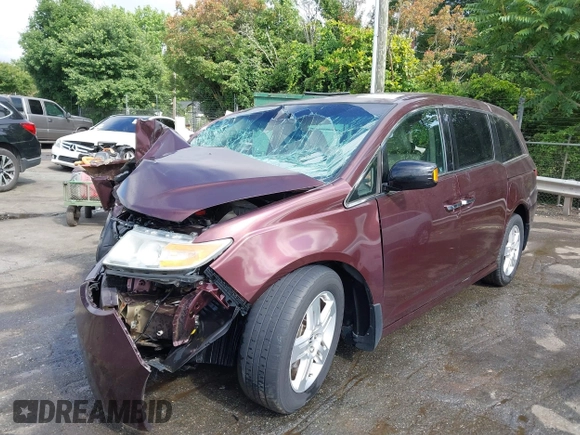 2012 Honda Odyssey Touring z VIN 5FNRL5H98CB035454, wystawiony jako IAAI lot #42285987 z przebiegiem Nie podano mil oraz . Historia ofert i sprzedaży dostępna na DreamBid. Obrazek 2.