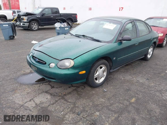1999 Ford Taurus z VIN 1FAFP52S9XG309250, wystawiony jako IAAI lot #41797222 z przebiegiem 102 676 mil mil oraz . Historia ofert i sprzedaży dostępna na DreamBid. Obrazek 17.