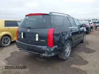 2004 Cadillac SRX with VIN 1GYDE63A540153774, listed as a IAAI auction lot 41500070 with 144,718 mi miles. Bid and sale history available at carsss.com. Image 4.