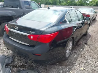2014 Infiniti Q50 Premium z VIN JN1BV7AR4EM695666, wystawiony jako IAAI lot #42437594 z przebiegiem 141 008 mil mil oraz . Historia ofert i sprzedaży dostępna na DreamBid. Obrazek 4.