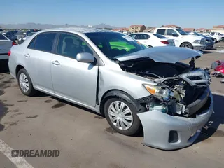 2011 Toyota Corolla L with VIN JTDBU4EE0B9151332, listed as a IAAI auction lot 41970433 with 113,157 mi miles. Bid and sale history available at carsss.com. Image 1.