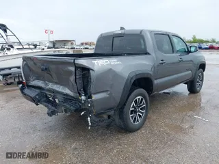 2021 Toyota Tacoma 2WD SR5 with VIN 5TFAZ5CNXMX097509, listed as a IAAI auction lot 41889399 with 81,598 mi miles. Bid and sale history available at carsss.com. Image 4.