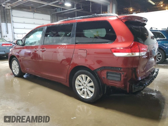 2014 Toyota Sienna LE with VIN 5TDJK3DC9ES083307, listed as a Copart auction lot 57939385 with 132,494 mi miles and Salvage title. Bid and sale history available at DreamBid. Image 2.