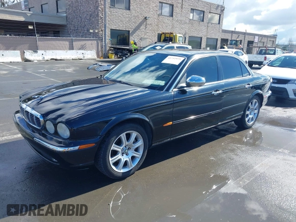 2004 Jaguar XJ with VIN SAJEA74C94SG11224, listed as a IAAI auction lot 41732975 with 204,815 mi miles and . Bid and sale history available at DreamBid. Image 2.