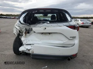 2021 Mazda CX-5 Signature with VIN JM3KFBEY5M0421694, listed as a Copart auction lot 85709714 with 28,126 mi miles and Salvage Title. Bid and sale history available at carsss.com. Image 6.