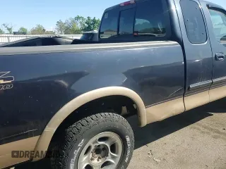 2000 Ford F-150 XL с VIN 1FTRX18L1YNA53246, выставлен на аукционе Copart как лот 56052295 с пробегом Не указан миль и Списание • Salvage title. История ставок и продаж доступна на DreamBid. Изображение 13.