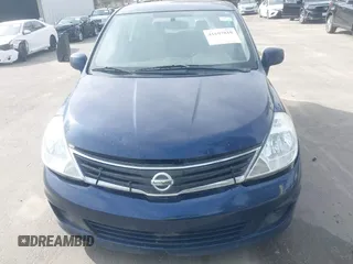 2012 Nissan Versa S with VIN 3N1BC1CPXCK250182, listed as a IAAI auction lot 41697818 with 122,450 mi miles. Bid and sale history available at carsss.com. Image 6.