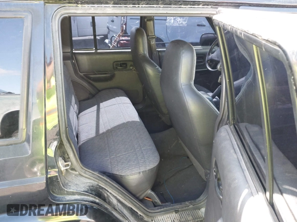 1999 Jeep Cherokee Sport с VIN 1J4FT68S9XL557938, выставлен на аукционе IAAI как лот 42208261 с пробегом 196 386 миль миль и . История ставок и продаж доступна на DreamBid. Изображение 8.