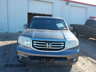 2015 Honda Pilot EX-L with VIN 5FNYF4H57FB063115, listed as a IAAI auction lot 41248234 with 187,752 mi miles and . Bid and sale history available at carsss.com. Image 12.