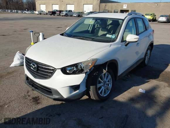 2016 Mazda CX-5 Sport with VIN JM3KE4BY8G0605504, listed as a IAAI auction lot 41866173 with 91,797 mi miles. Bid and sale history available at carsss.com. Image 18.