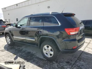 2012 Jeep Grand Cherokee Laredo with VIN 1C4RJFAG7CC347038, listed as a Copart auction lot 51181285 with 159,291 mi miles and Salvage Title. Bid and sale history available at carsss.com. Image 2.