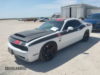 2019 Dodge Challenger R/T Scat Pack Widebody z VIN 2C3CDZFJ1KH546489, wystawiony jako IAAI lot #41857292 z przebiegiem 61 055 mil mil oraz . Historia ofert i sprzedaży dostępna na DreamBid. Obrazek 2.