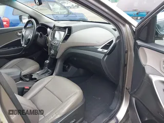 2014 Hyundai Santa Fe z VIN 5XYZW3LA2EG217854, wystawiony jako IAAI lot #42318822 z przebiegiem 120 234 mil mil oraz . Historia ofert i sprzedaży dostępna na DreamBid. Obrazek 5.