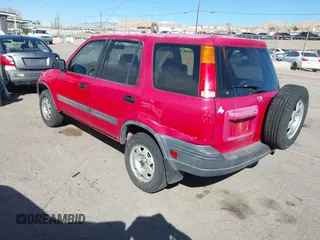 1999 Honda CR-V LX with VIN JHLRD2847XC009921, listed as a IAAI auction lot 41795325 with 268,638 mi miles. Bid and sale history available at carsss.com. Image 3.