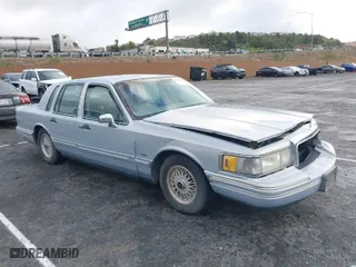 1993 Lincoln Town Car Executive with VIN 1LNLM81W6PY618899, listed as a IAAI auction lot 41566437 with 158,821 mi miles. Bid and sale history available at carsss.com. Image 1.
