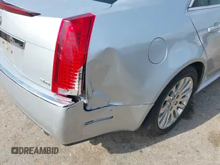 2012 Cadillac CTS Performance z VIN 1G6DJ5E37C0145221, wystawiony jako IAAI lot #42111935 z przebiegiem 82 103 mil mil oraz . Historia ofert i sprzedaży dostępna na DreamBid. Obrazek 12.