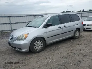 2010 Honda Odyssey LX z VIN 5FNRL3H29AB016853, wystawiony jako Copart lot #56602085 z przebiegiem 154 518 mil mil oraz Szkoda całkowita • Salvage title. Historia ofert i sprzedaży dostępna na DreamBid. Obrazek 1.