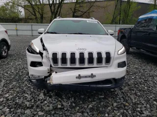 2017 Jeep Cherokee Limited with VIN 1C4PJMDB1HW562142, listed as a Copart auction lot 55366515 with 201,577 mi miles and Salvage title. Bid and sale history available at DreamBid. Image 5.