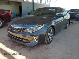 2018 Kia Optima SX with VIN 5XXGW4L2XJG201082, listed as a Copart auction lot 54331495 with 76,703 mi miles and Salvage title. Bid and sale history available at DreamBid. Image 1.