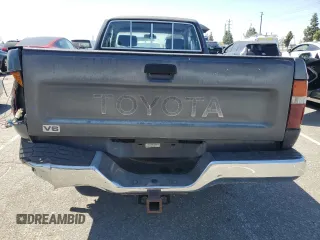 1992 Toyota Pickup z VIN JT4VN93DXN5033608, wystawiony jako Copart lot #52547095 z przebiegiem 125 092 mil mil oraz Szkoda całkowita • Salvage title. Historia ofert i sprzedaży dostępna na DreamBid. Obrazek 6.