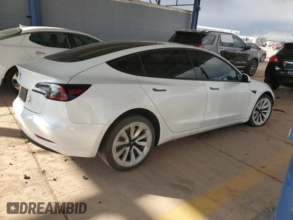 2022 Tesla Model 3 Long Range with VIN 5YJ3E1EB7NF296285, listed as a Copart auction lot 43058565 with 70,946 mi miles and Salvage Title. Bid and sale history available at carsss.com. Image 3.