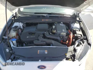 2013 Ford Fusion SE Hybrid z VIN 3FA6P0LU6DR325719, wystawiony jako Copart lot #55777715 z przebiegiem 152 478 mil mil oraz Szkoda całkowita • Salvage title. Historia ofert i sprzedaży dostępna na DreamBid. Obrazek 11.