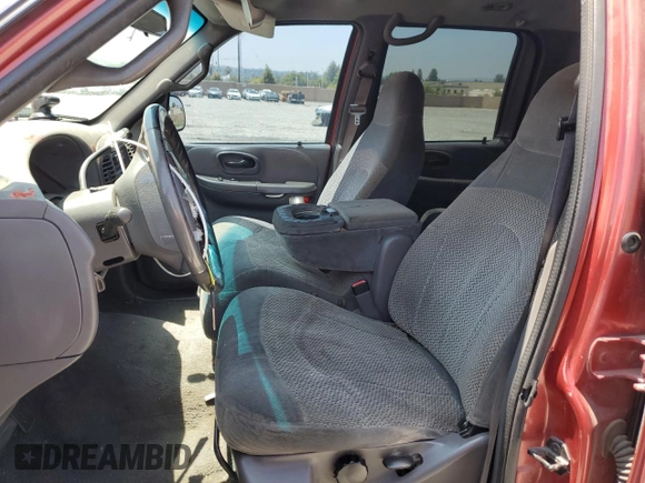 2001 Ford F-150 XLT с VIN 1FTRW07L01KF03457, выставлен на аукционе Copart как лот 60086725 с пробегом 205 917 миль миль и Списание • Salvage title. История ставок и продаж доступна на DreamBid. Изображение 7.