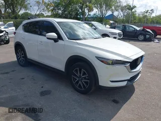 2018 Mazda CX-5 Grand Touring with VIN JM3KFBDM6J0451605, listed as a IAAI auction lot 42099182 with 81,703 mi miles and . Bid and sale history available at DreamBid. Image 1.