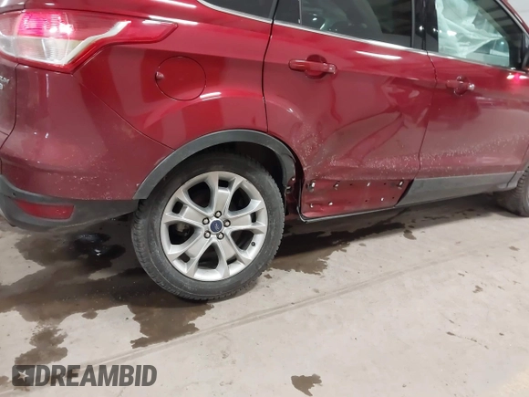2014 Ford Escape Titanium with VIN 1FMCU9J9XEUA51732, listed as a IAAI auction lot 41542867 with 44,141 mi miles. Bid and sale history available at carsss.com. Image 6.