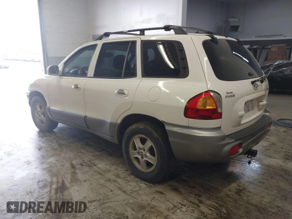 2004 Hyundai Santa Fe GLS with VIN KM8SC13E44U797943, listed as a IAAI auction lot 41731356 with 184,139 mi miles. Bid and sale history available at carsss.com. Image 3.