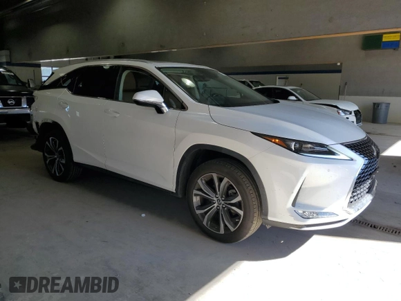 2022 Lexus RX with VIN JTJHZKEA2N2024718, listed as a Copart auction lot 47320555 with 35,742 mi miles and Salvage Title. Bid and sale history available at carsss.com. Image 4.
