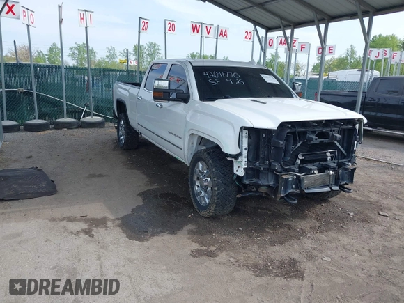 2016 GMC Sierra 2500HD Denali with VIN 1GT12UE86GF267431, listed as a IAAI auction lot 42091770 with 128,525 mi miles and . Bid and sale history available at DreamBid. Image 1.