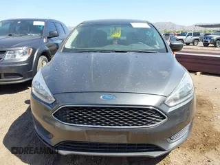 2018 Ford Focus SE with VIN 1FADP3FE6JL270910, listed as a IAAI auction lot 42130371 with 121,240 mi miles. Bid and sale history available at carsss.com. Image 6.