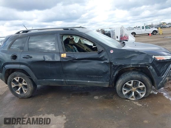 2014 Jeep Cherokee Trailhawk with VIN 1C4PJMBS5EW128658, listed as a IAAI auction lot 41722320 with 1 mi miles. Bid and sale history available at carsss.com. Image 12.