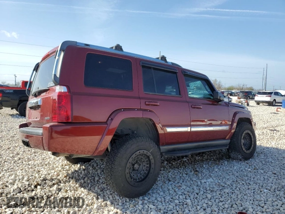 2007 Jeep Commander Limited z VIN 1J8HG58257C610852, wystawiony jako Copart lot #49461225 z przebiegiem 91 125 mil mil oraz Szkoda całkowita • Salvage title. Historia ofert i sprzedaży dostępna na DreamBid. Obrazek 3.