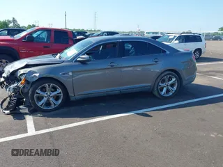 2011 Ford Taurus SHO with VIN 1FAHP2KT4BG129439, listed as a IAAI auction lot 42495871 with 164,841 mi miles and . Bid and sale history available at DreamBid. Image 2.