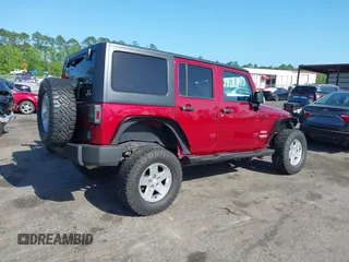 2011 Jeep Wrangler Unlimited Sport with VIN 1J4BA3H18BL598323, listed as a IAAI auction lot 41958043 with 154,354 mi miles. Bid and sale history available at carsss.com. Image 4.