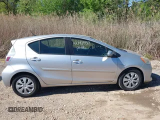 2013 Toyota Prius One with VIN JTDKDTB30D1047034, listed as a IAAI auction lot 42143557 with 186,866 mi miles. Bid and sale history available at carsss.com. Image 13.