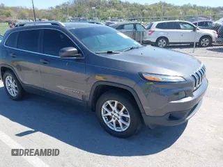 2014 Jeep Cherokee Latitude with VIN 1C4PJMCS2EW137767, listed as a IAAI auction lot 42052071 with 165,300 mi miles and . Bid and sale history available at carsss.com. Image 1.
