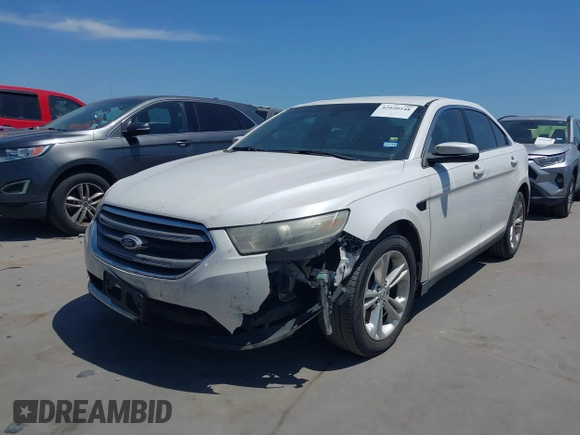 2013 Ford Taurus SEL with VIN 1FAHP2E83DG212029, listed as a IAAI auction lot 42020548 with 172,887 mi miles. Bid and sale history available at carsss.com. Image 2.