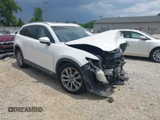 2017 Mazda CX-9 Signature z VIN JM3TCBEY4H0131899, wystawiony jako IAAI lot #42594622 z przebiegiem 111 831 mil mil oraz . Historia ofert i sprzedaży dostępna na DreamBid. Obrazek 1.
